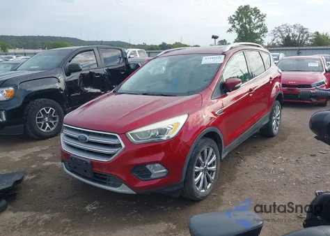 2017 Ford Escape Titanium z USA, uszkodzony, nr VIN 1FMCU9J92HUE25190